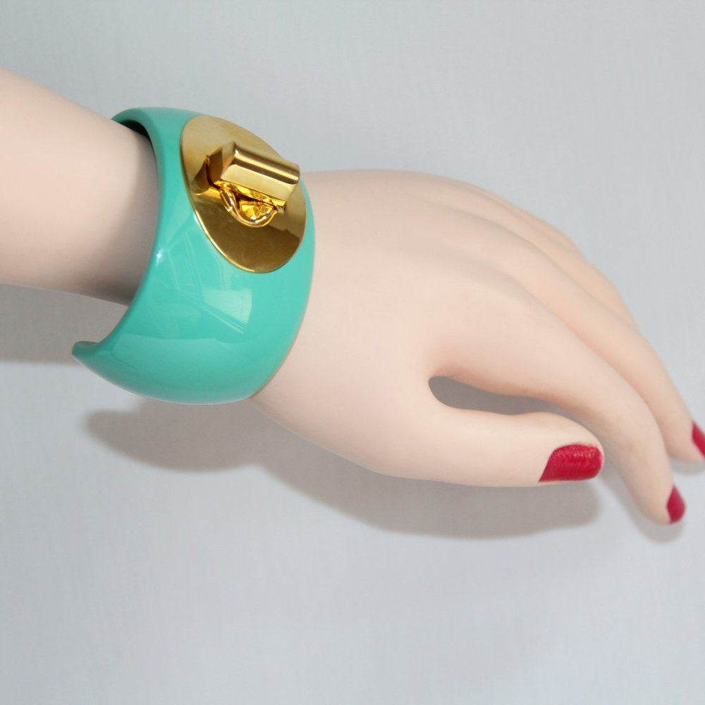Coach Aqua Acrylic Gold Turnlock Cuff Bracelet
